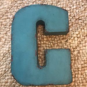Decorative letter “C” in real with rustic look